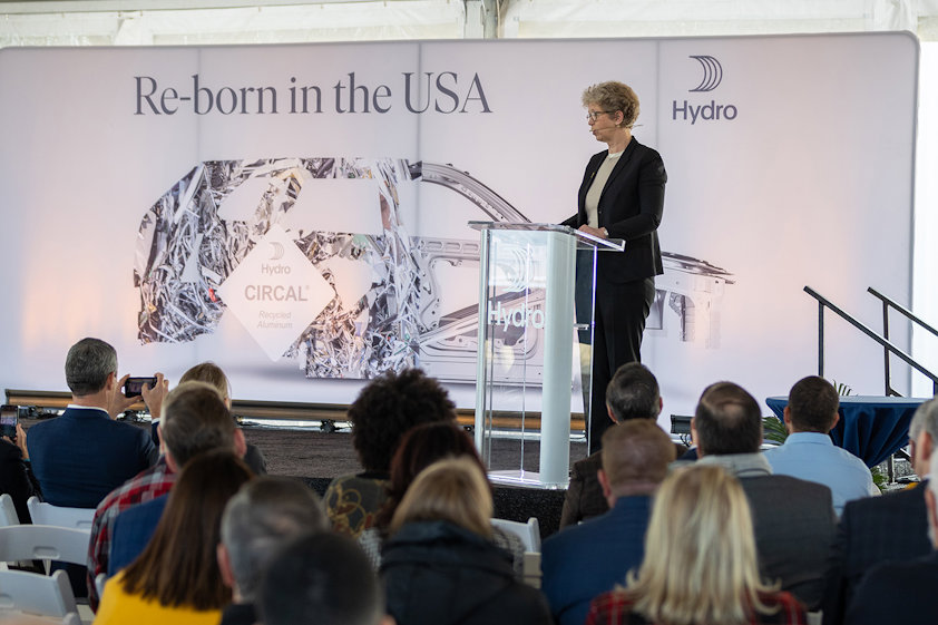 a person standing in front of a crowd of people