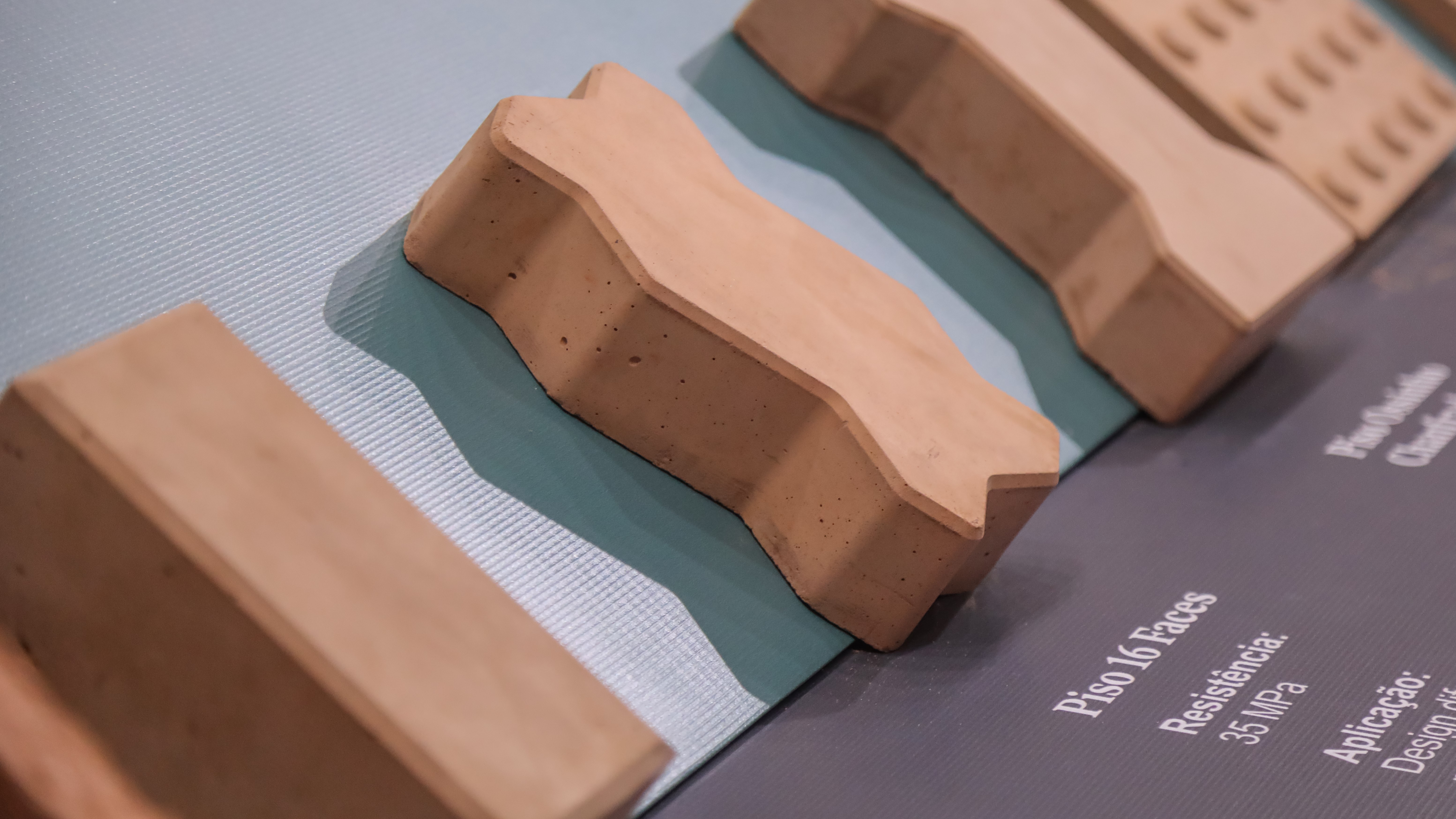 a group of brown bricks on a blue surface