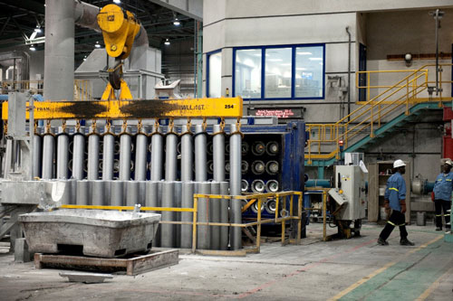 a person walking next to a machine