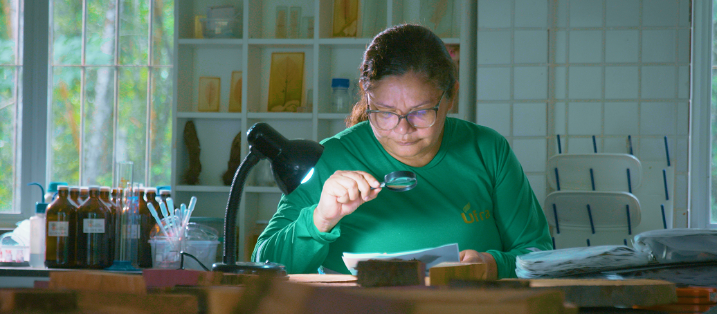 a person using a microscope