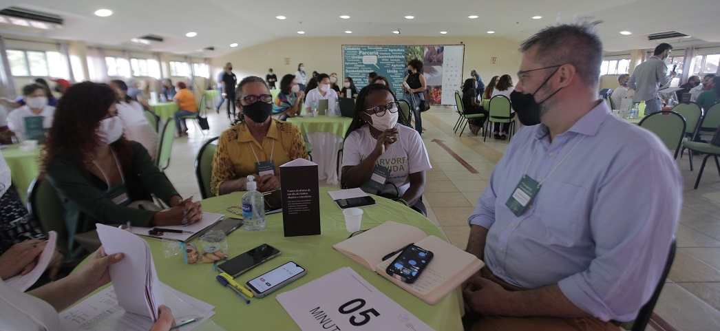a group of people sitting at a table